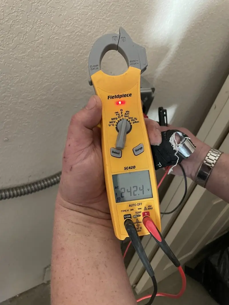 Voltage testing with clamp meter during Circuit Breaker Repair in Hardwick